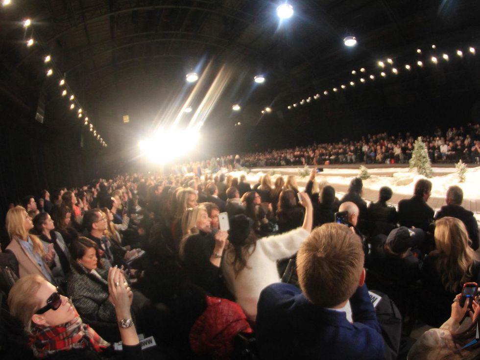Houston Fashion Week crowd with runway lights