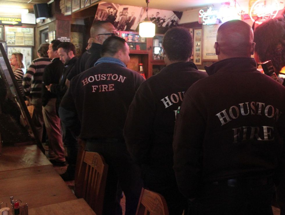 Houston firefighters in line at Goode Company BBQ