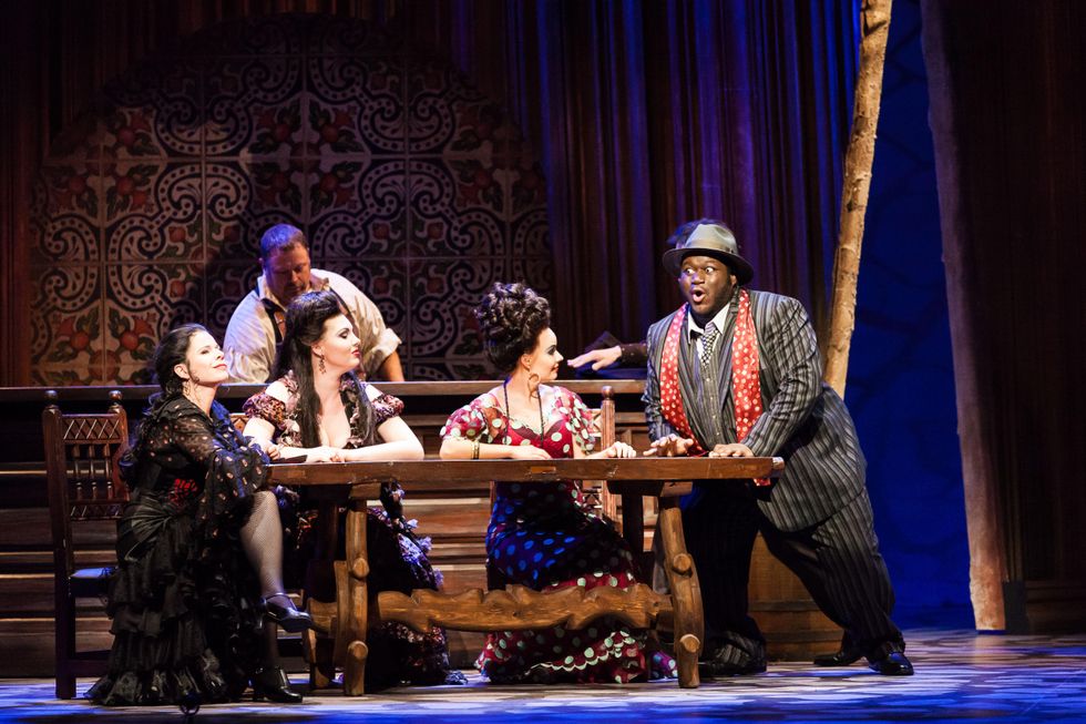 Houston Grand Opera Carmen Ana Mar\u00eda Mart\u00ednez as Carmen, Carolyn Sproule as Mercedes, Uliana Alexyuk as Frasquita, Reginald Smith Jr. as Danciare. In the background- James Jennings as Chorister April 2014