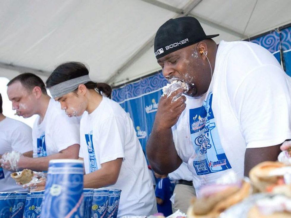 Houston Greek Festival gyro eating contest Niko Niko's in progress May 2013