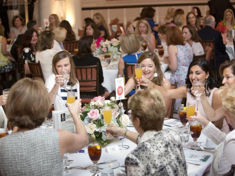 Houston, Spaulding for Children luncheon, May 2017, tablemates toast