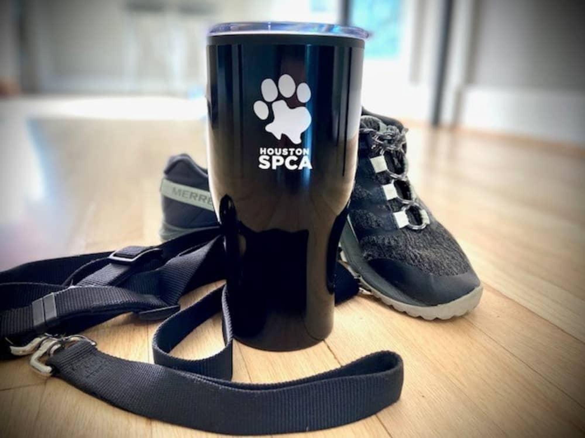 Houston SPCA cup and sneakers