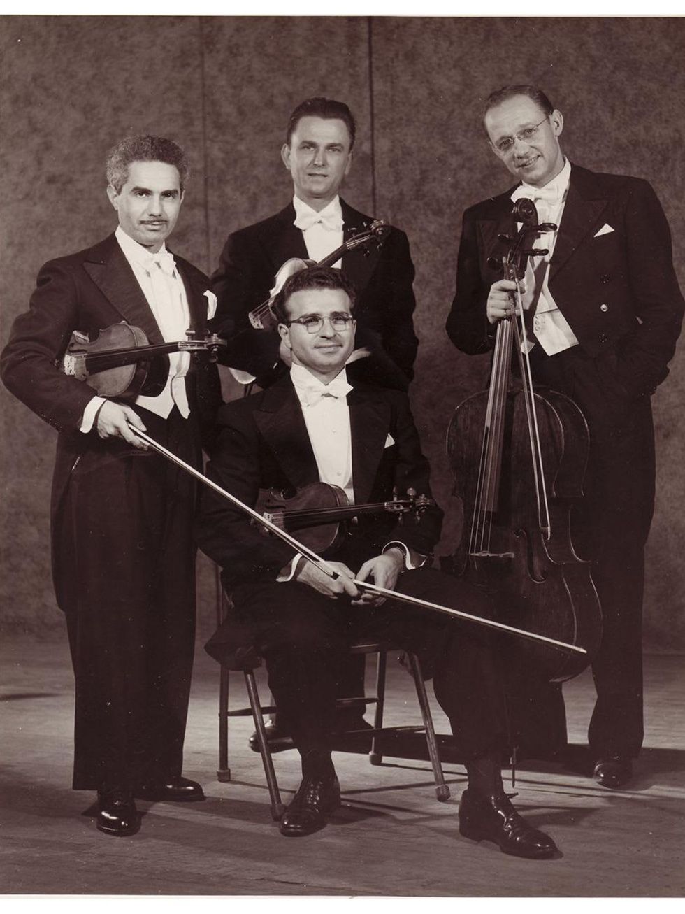 Houston Symphony String quartet: seated, Ray Fliegel; standing, Irving Wadler, Hank Hlavaty and Alfred Urbach