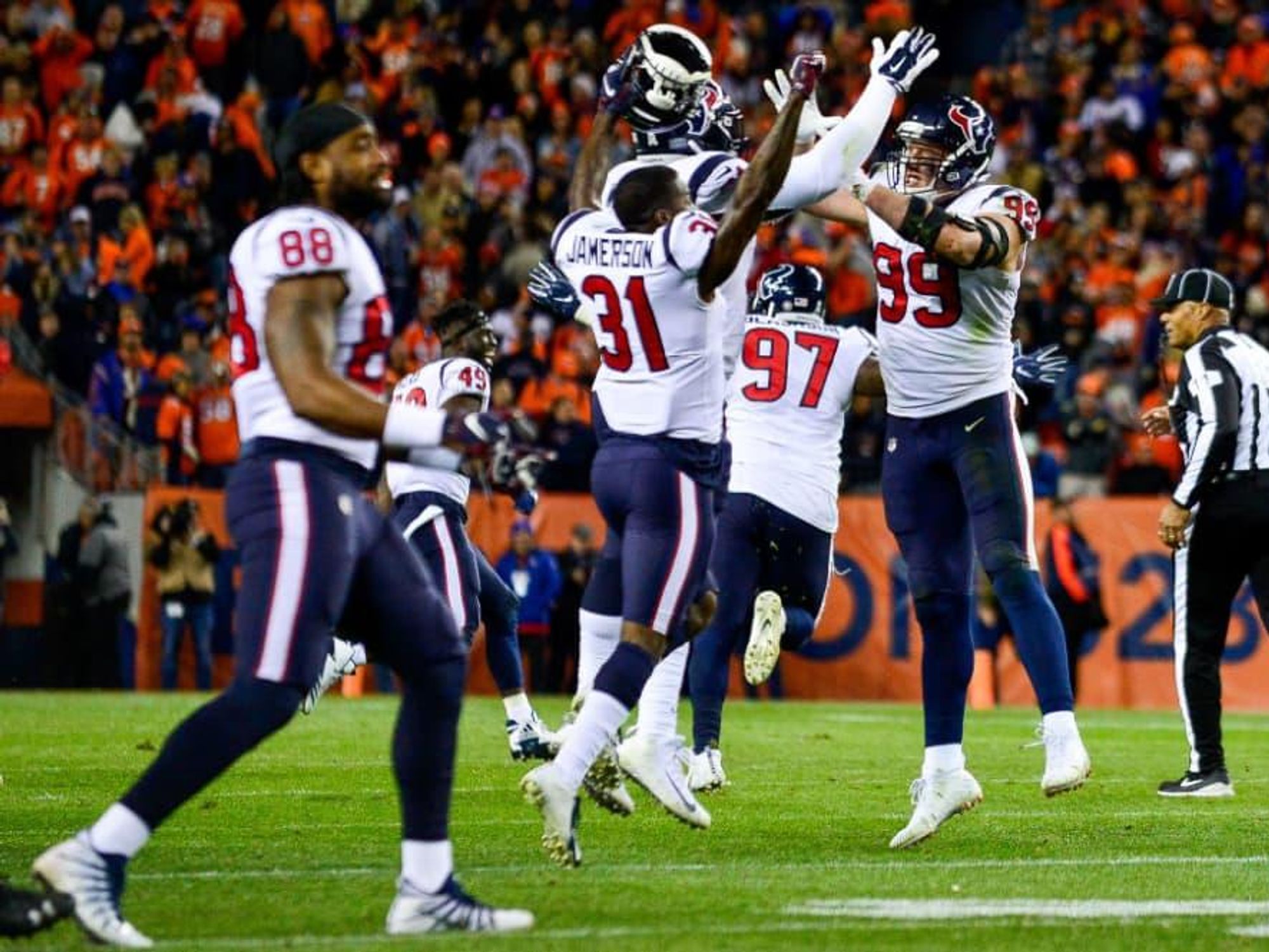 Houston Texans jumping celebrating JJ Watt