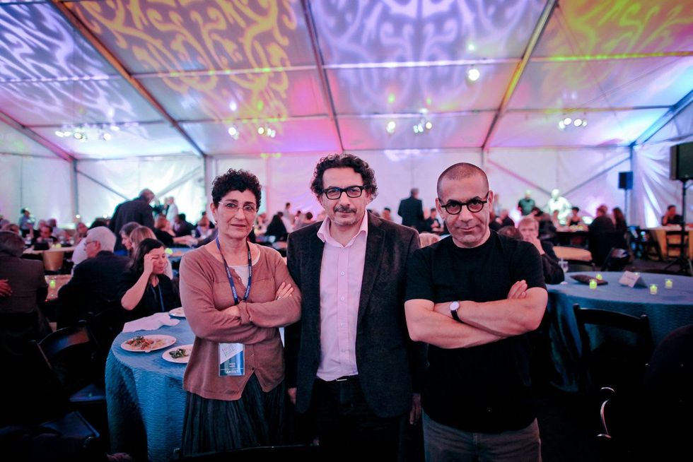 Huda Hutfi, from left, Nazar Yahya and Sadik Alfraji at the FotoFest opening party March 2014