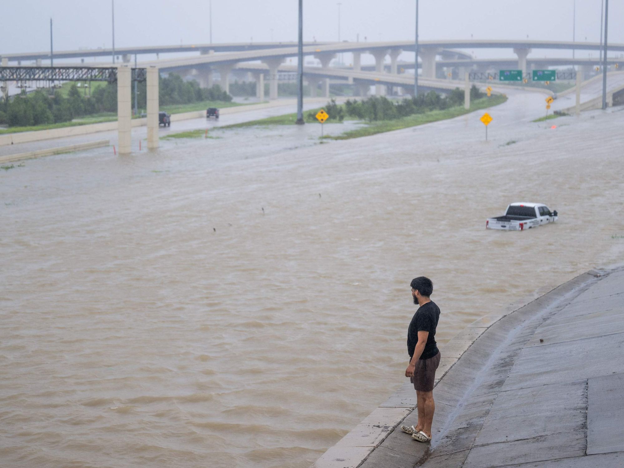 Hurricane Beryl flooded car