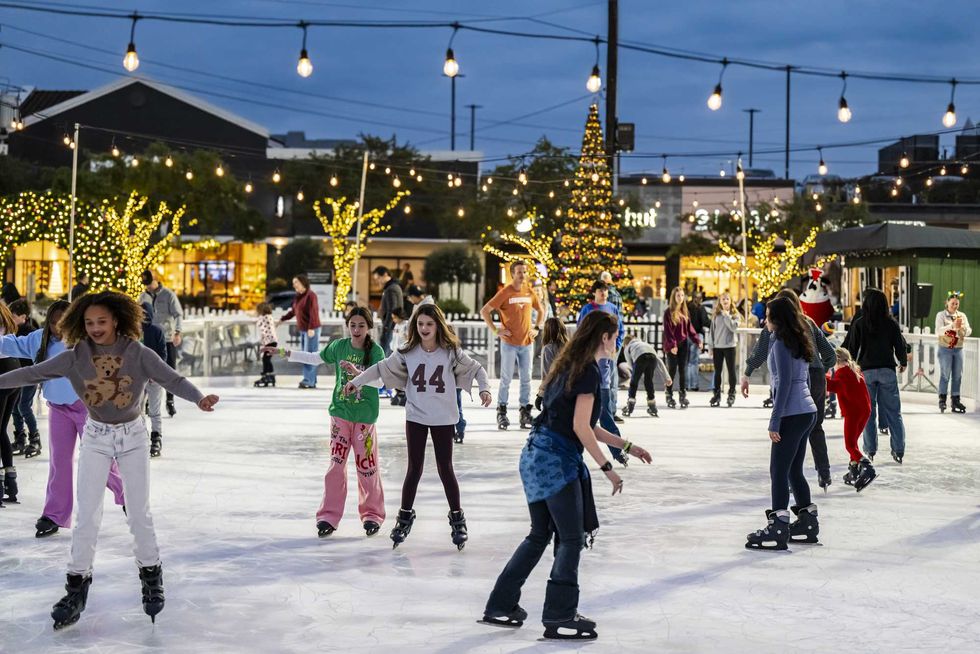 Ice skaters on a rink outside