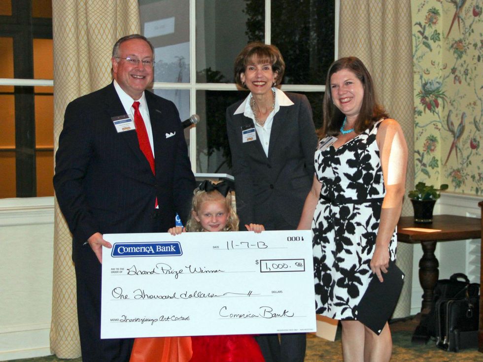 J. Downey Bridgewater, from left, grand prize winner in age 6 and younger category Maya, Jennfer Jarriel and Maya's mother, Cathy November 2013