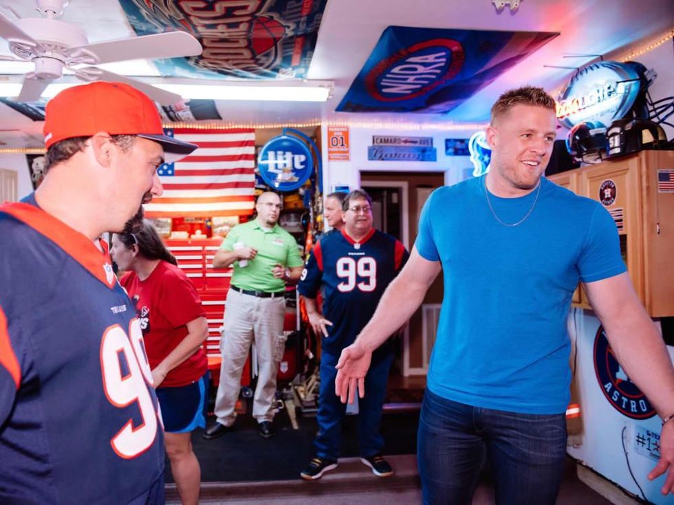 J.J. Watt delivers pizza checks out man cave of Wayne Lominac