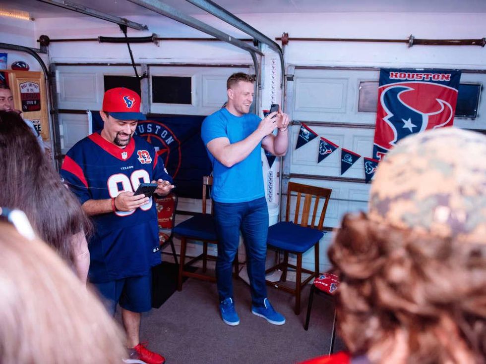 J.J. Watt delivers pizza checks out man cave of Wayne Lominac