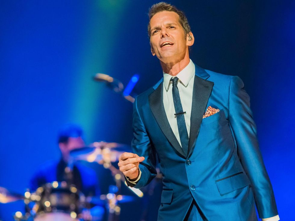 J. Robert Spencer singing and snapping fingers