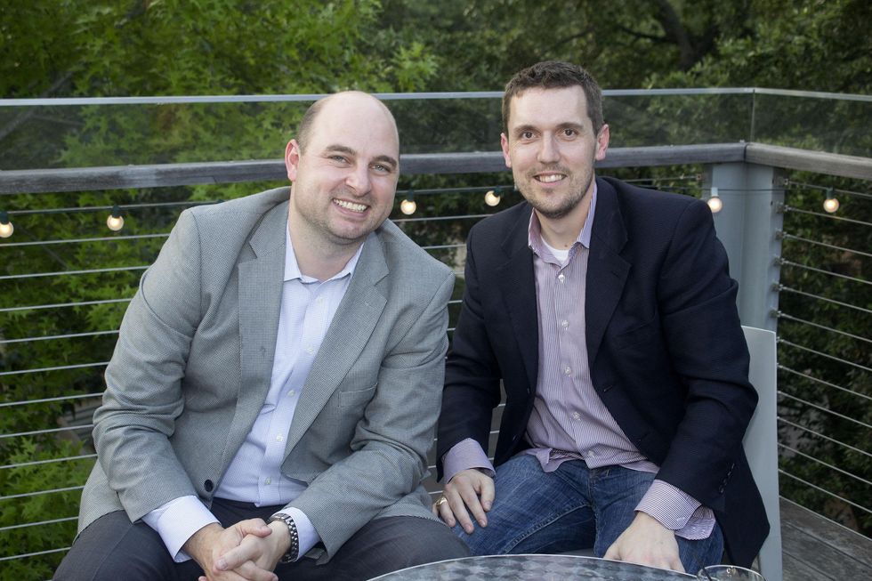 Jake Donaldson, left, and Keither Holley at the f.r.e.s.h. new young professionals group party june 2014