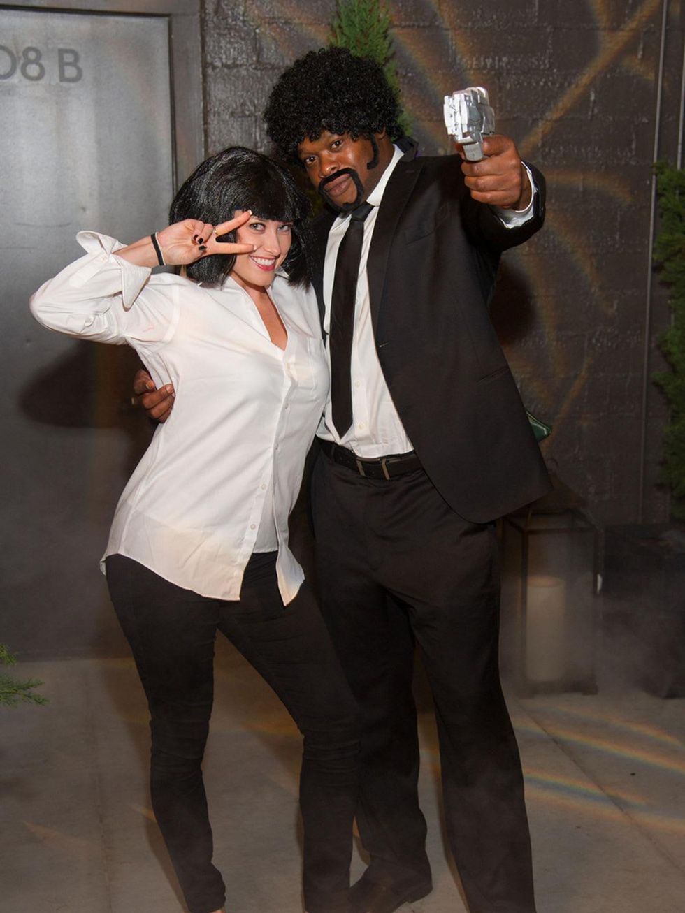 Jara McKee and Austine Nwabuisi at the St. Luke's PULSE Saints & Sinners Halloween party October 2013