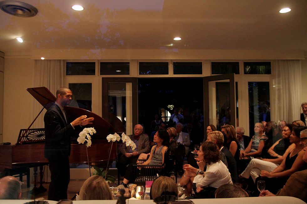 Jason Moran speaking to the crowd at the Da Camera Jason Moran launch party September 2014
