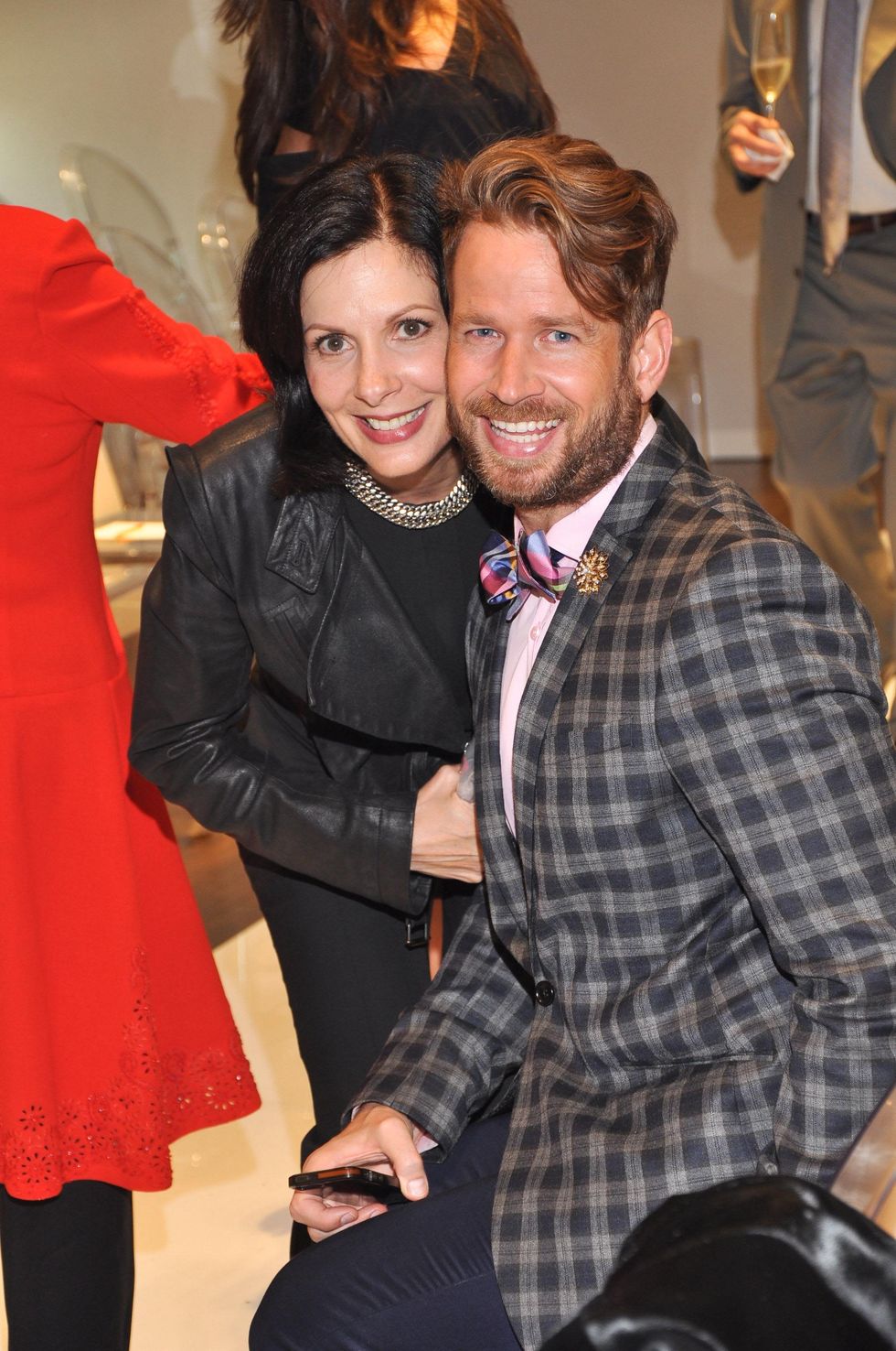 Jeanne Ruberti and Jeff Shell at the Pamella Roland runway show at Elizabeth Anthony November 2014
