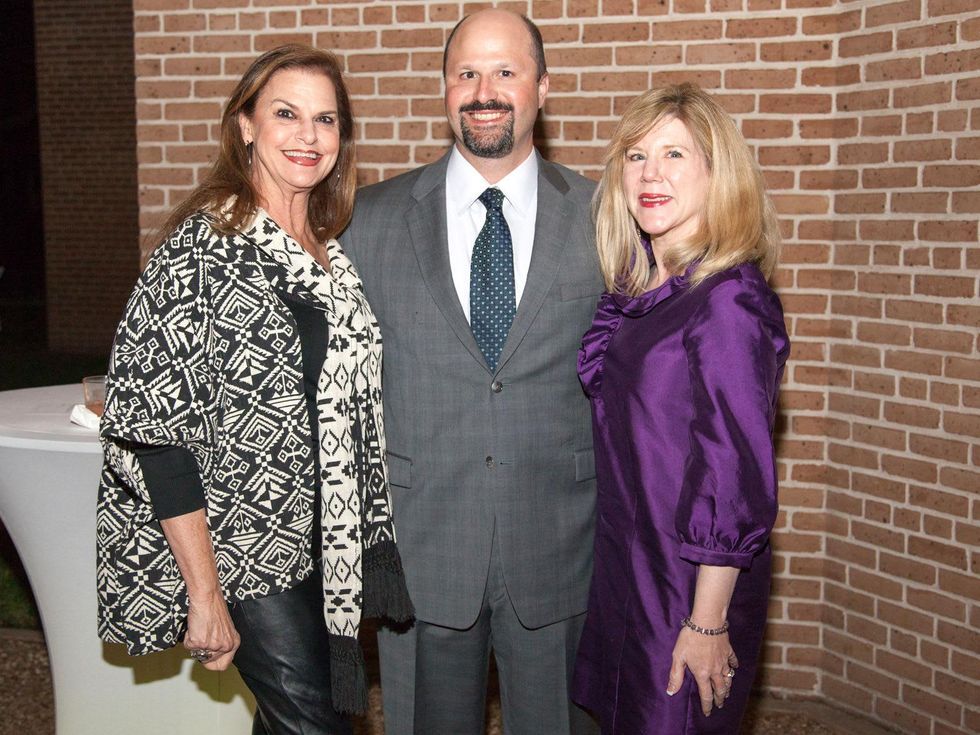 Jennifer Elkins, left, with Mark and Katherine Yzaguirre at Rothko Chapel's Moonrise Party on the Plaza October 2013