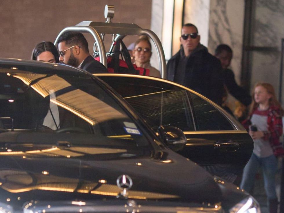 Jennifer Lopez and Alex Rodriguez check out of Four Seasons Hotel after Game 5 of World Series