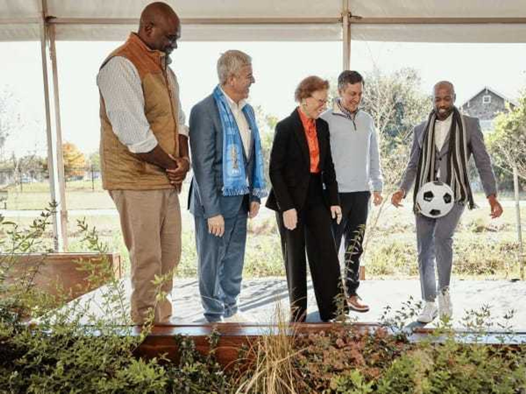 Jerry Davis, Julian Ramirez, Laura Spanjian, Chris Canetti, and DaMarcus Beasley at the Airbnb press conference Tuesday., December 2, 2025.