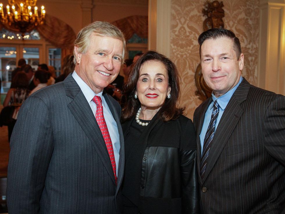 Jesse and Betty Tutor, from left, with Scott Evans at the Men of Distinction kick-off party February 2014