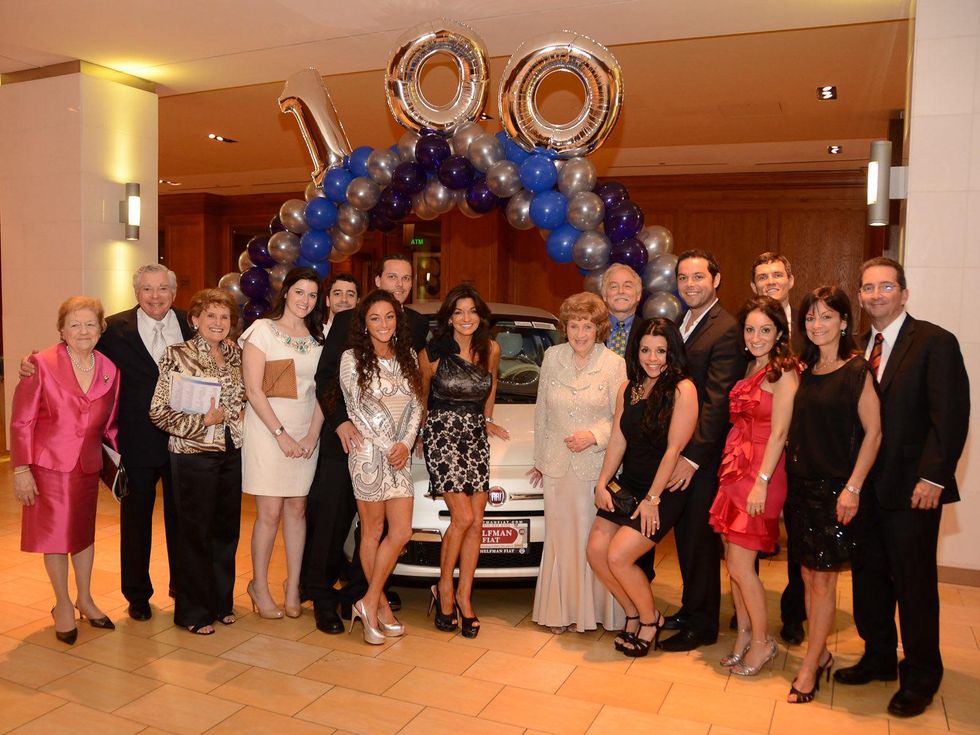 Jewish Family Services Houston 100th anniversary June 2013 Bess Wishnow and family members round the Grand Prize Fiat, donated by Helfman Fiat
