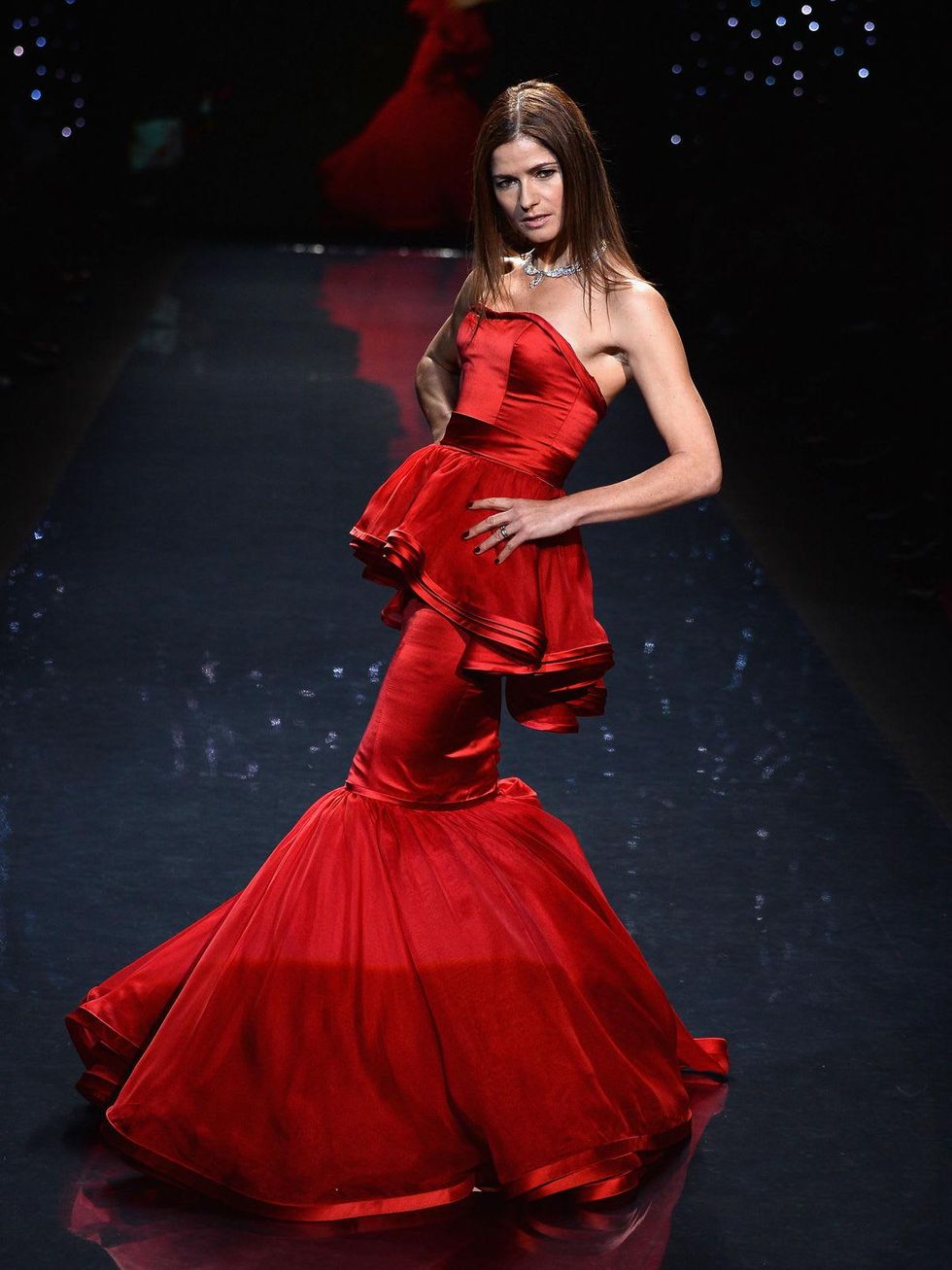 Jill Hennessy walks the runway wearing Dennis Blasso at Go Red For Women February 2014
