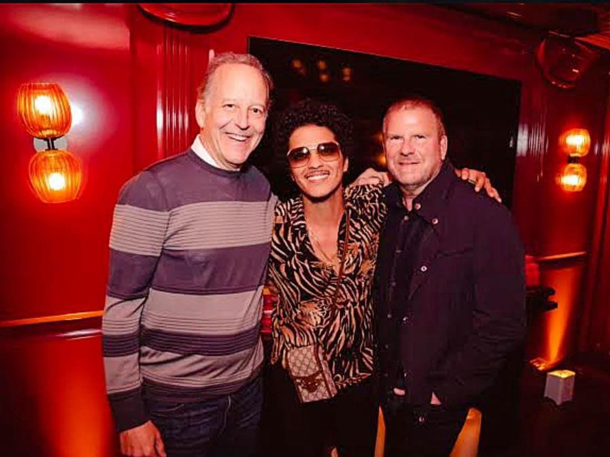 Jim Gray, Bruno Mars, and Tilman Fertitta at the Catch LA West Hollywood opening.