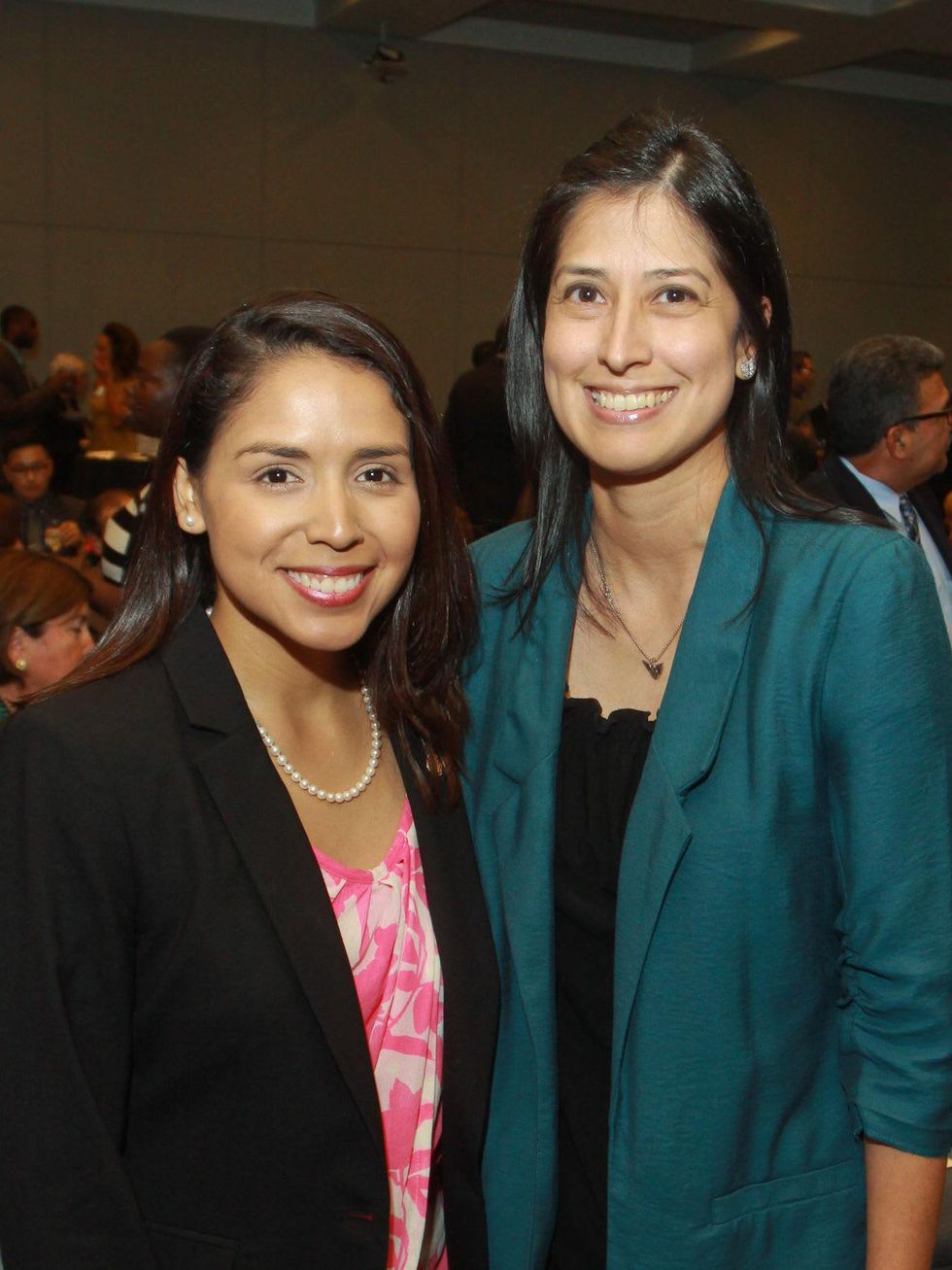 Jo Anna Castilleja, left, and Sonja Gonzales at the Emerging Leaders Institute 2013 class graduation.