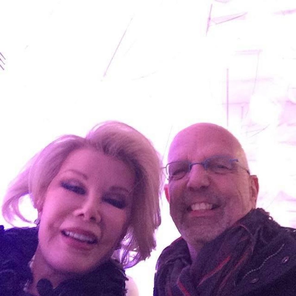 Joan Rivers and Clifford Pugh at Fashion Week February 2014