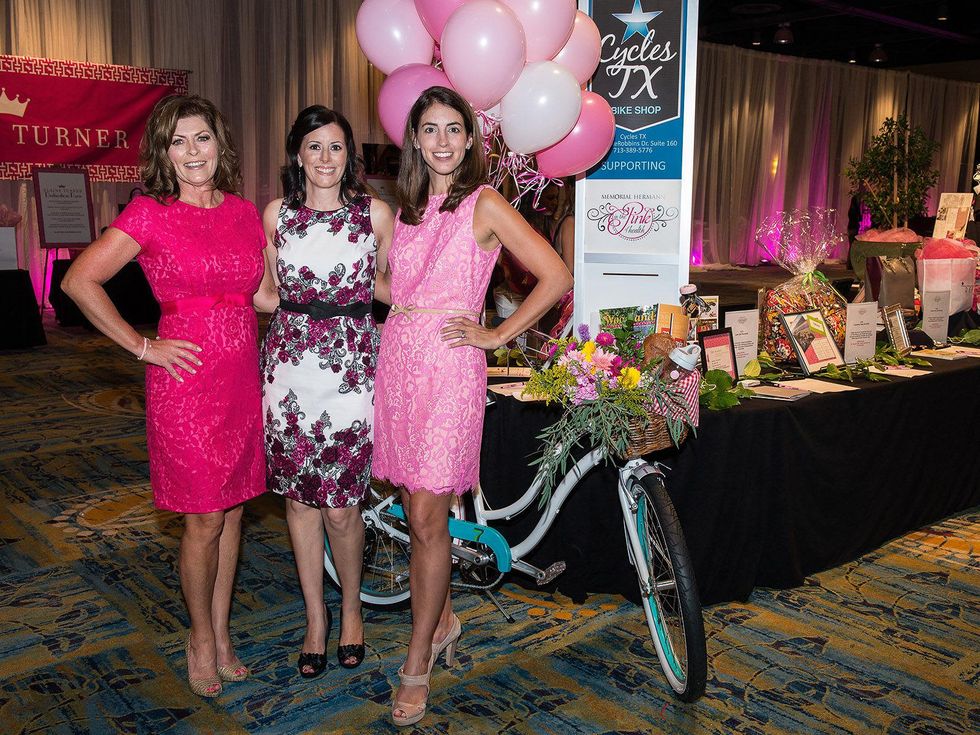 Jodi Powell, from left, Michelle Martere and Cindy Burgos at the In the Pink luncheon in The Woodlands October 2013
