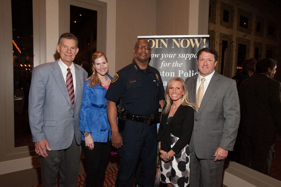 Joe and Jennifer Van Matre, from left, Charles McClelland and Susie and Robert Kneppler at the Houston Police Department benefit April 2015
