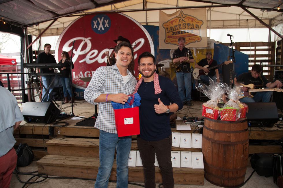 Joe Huber, left, and Andres Jaramillo at the Casa de Esperanza's Young Professionals 5th Annual Chili Cook Off February 2015