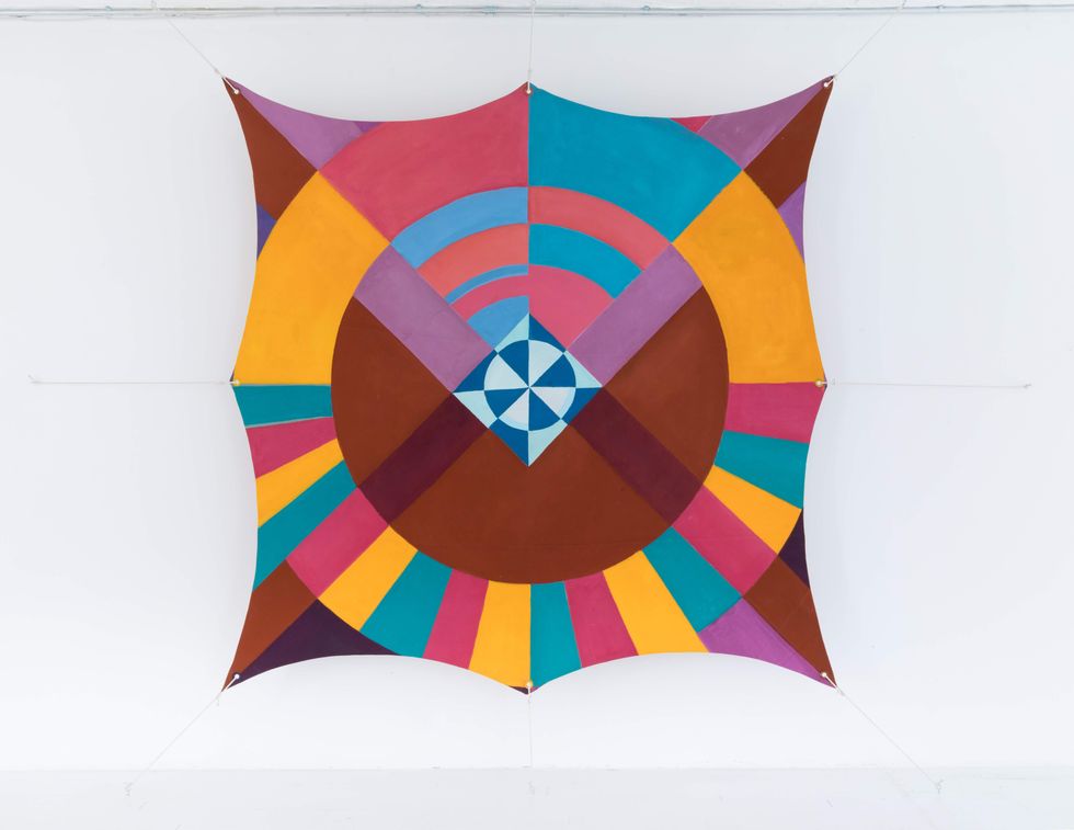 Joe Overstreet, HooDoo Mandala, 1970. Acrylic on canvas with metal grommets and\ncotton rope, 90 \u00d7 89 1/2 in. (228.6 \u00d7 227.3 cm). Neil Lane Collection. \u00a9 Estate\nof Joe Overstreet/Artist Rights Society (ARS), courtesy of Eric Firestone\nGallery, New York. Photo: Jenny Gorman