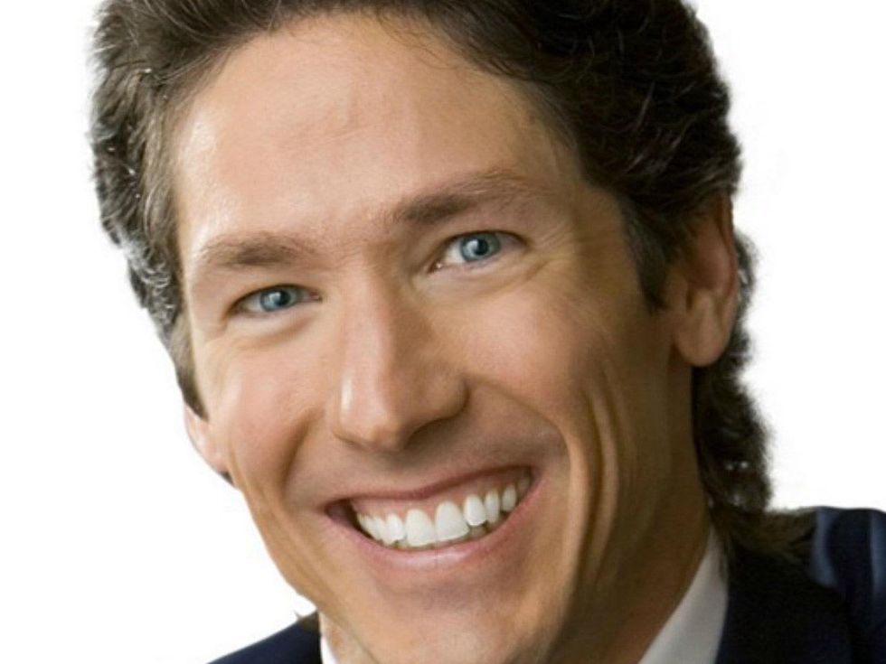 Joel Osteen smiling with white background head shot