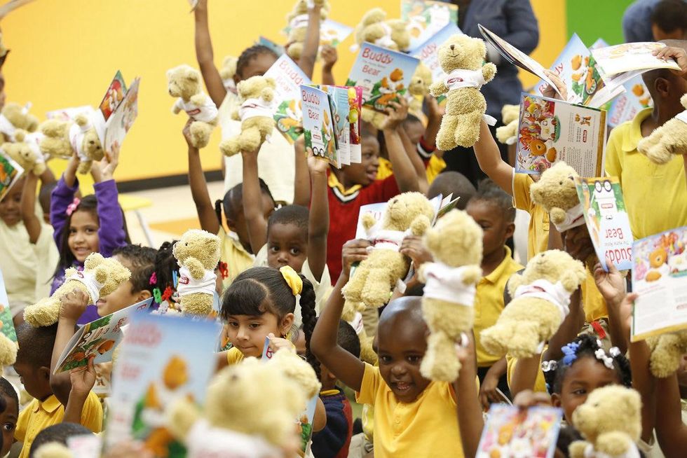 John Moore book donation and teddy bears