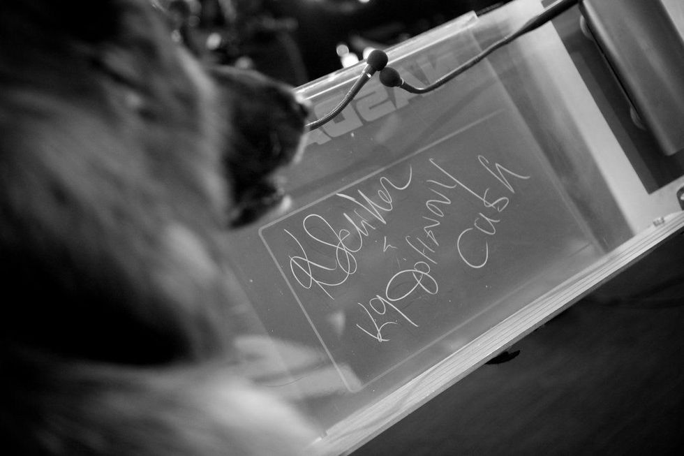 Johnny Cash signs in at NASDAQ to ring bell for K94Cops