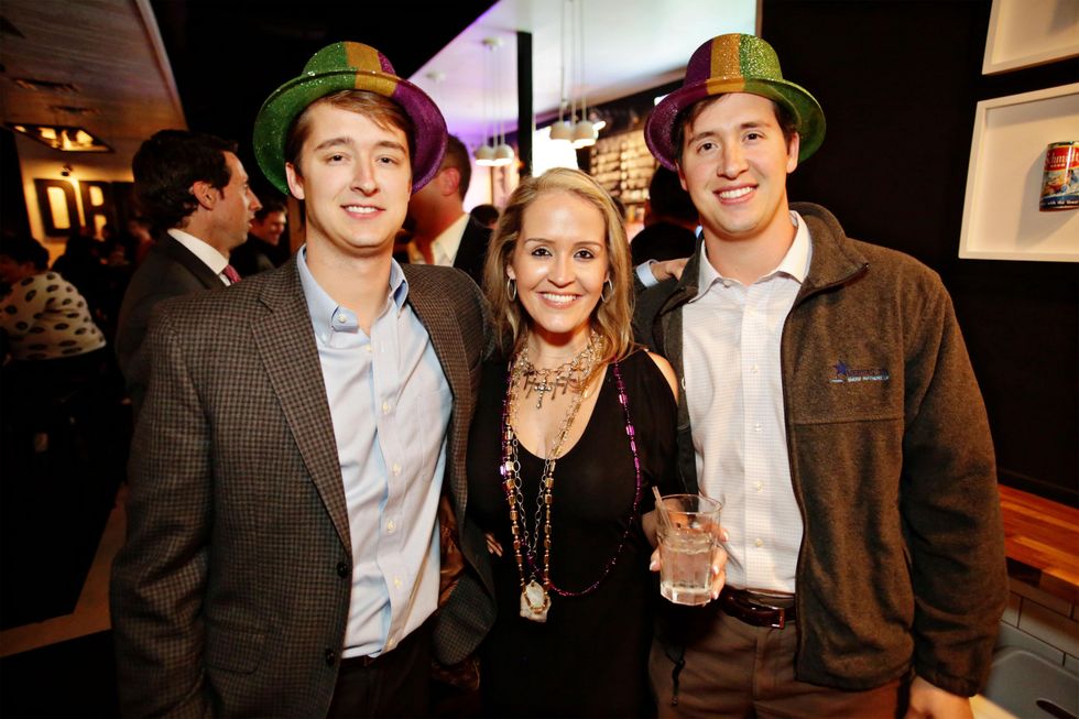 Jonas Fertitta, from left, Nicole Stresau and Luke Fertitta at Gray\u2019s Public House Mardi Gras grand opening benefiting Urban Green February 2015
