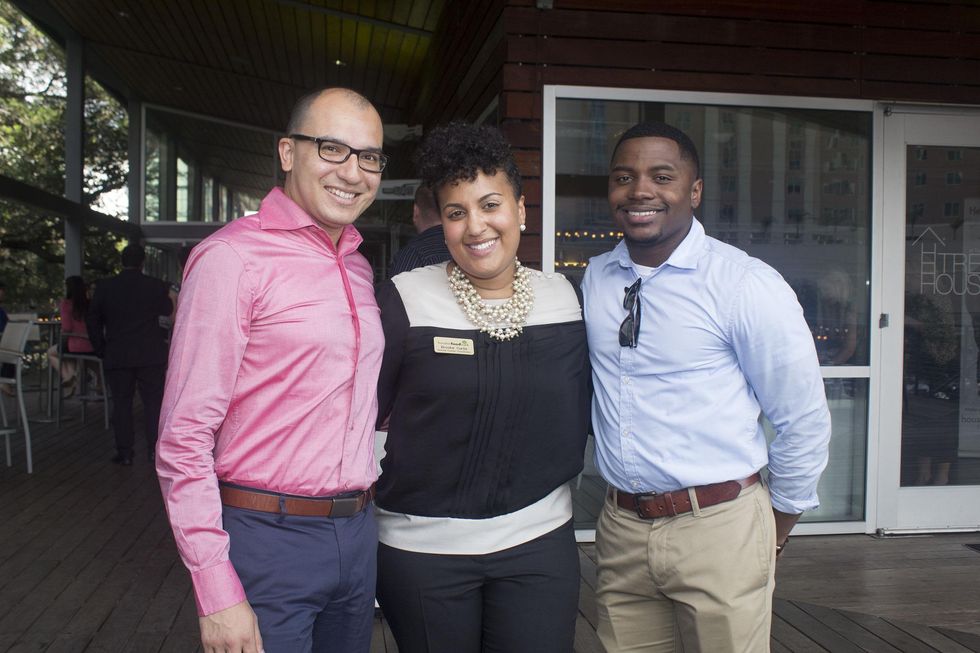 Jonathan Bisso from left, Brooke Curtis, and Tony Holmes at the f.r.e.s.h. new young professionals group party june 2014