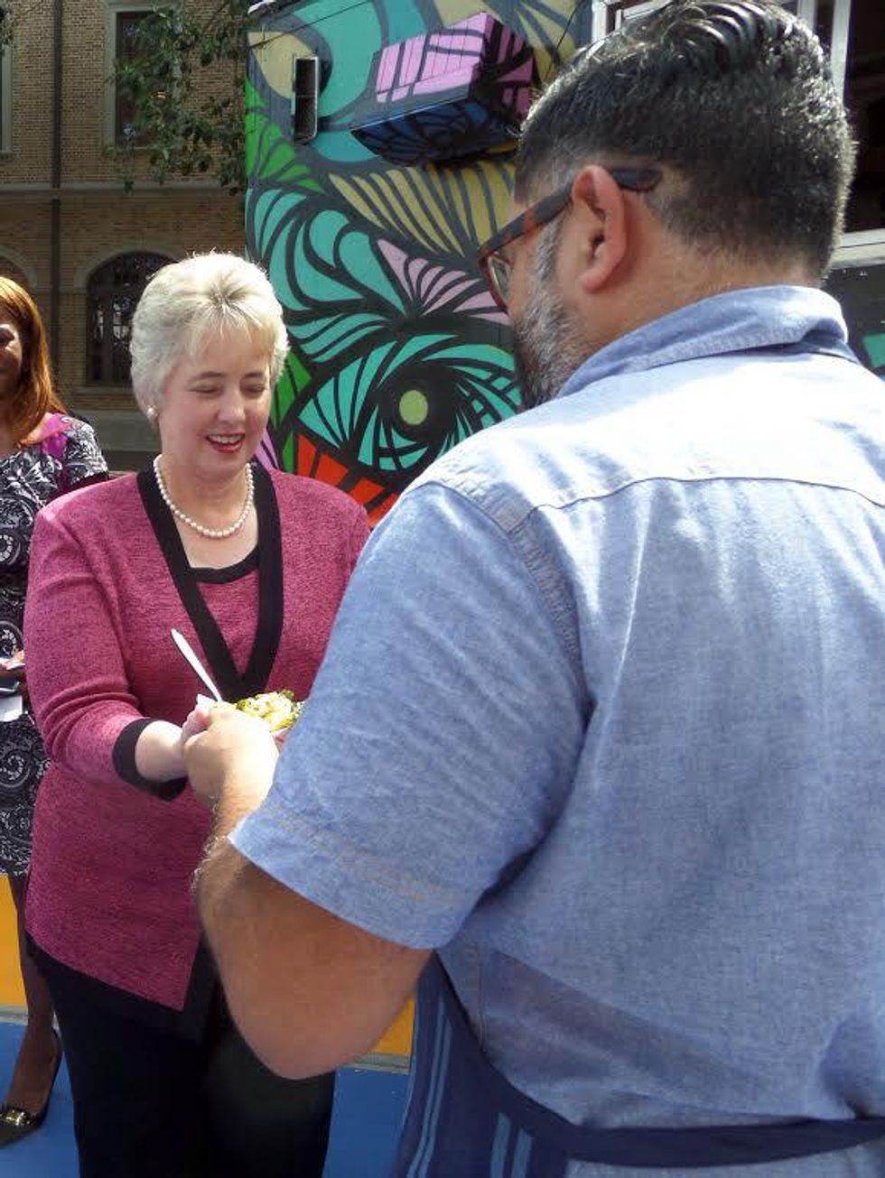 Josh Martinez of The Modular serves Mayor Parker