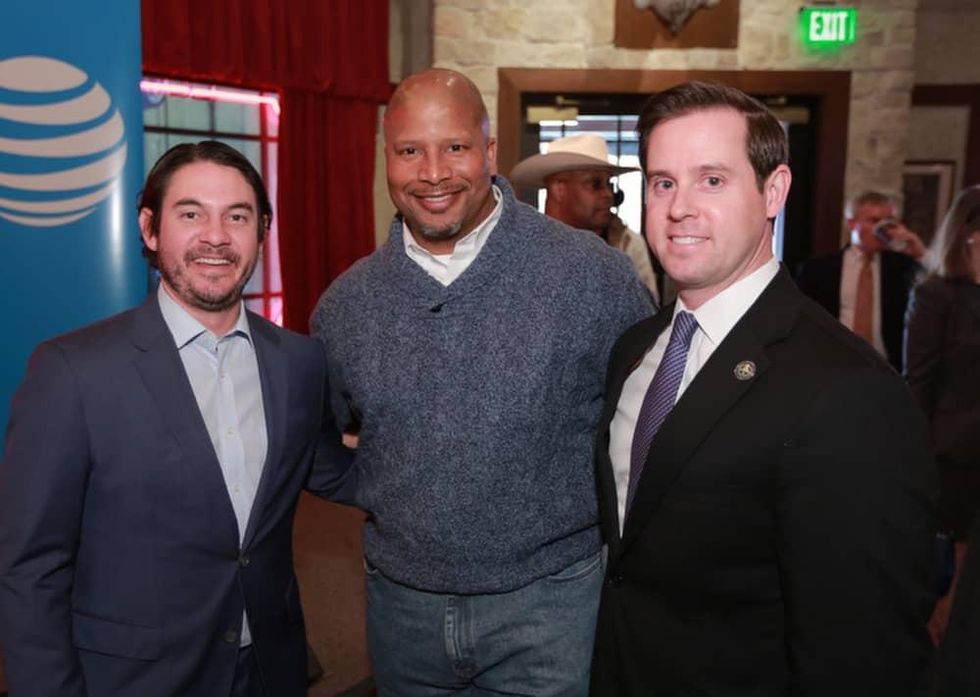 : Joshua Sanders, unidentifed, Chris Brown at Mayor's Rodeo Kickoff Breakfast
