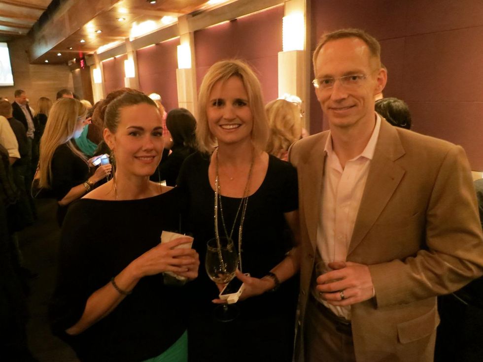 Josie Edwards, from left, Laura Carlock and David Carlock at the Rescued Pets Movement launch party November 2013