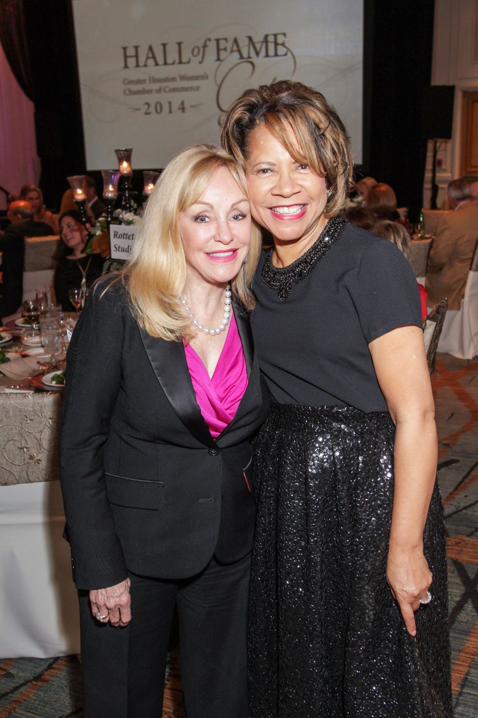 Judi McGee, left, and Merele Yarborough at the Women's Chamber of Commerce Hall of Fame Gala December 2014