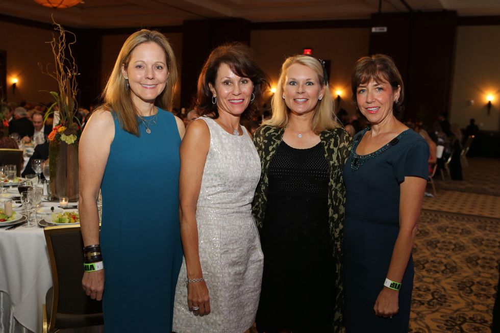 Julie Moorhead, from left, Dorothy Cuenod, Mindy Hildebrand and Mary Winters at the LifeHouse Houston Duck Dynasty dinner September 2014