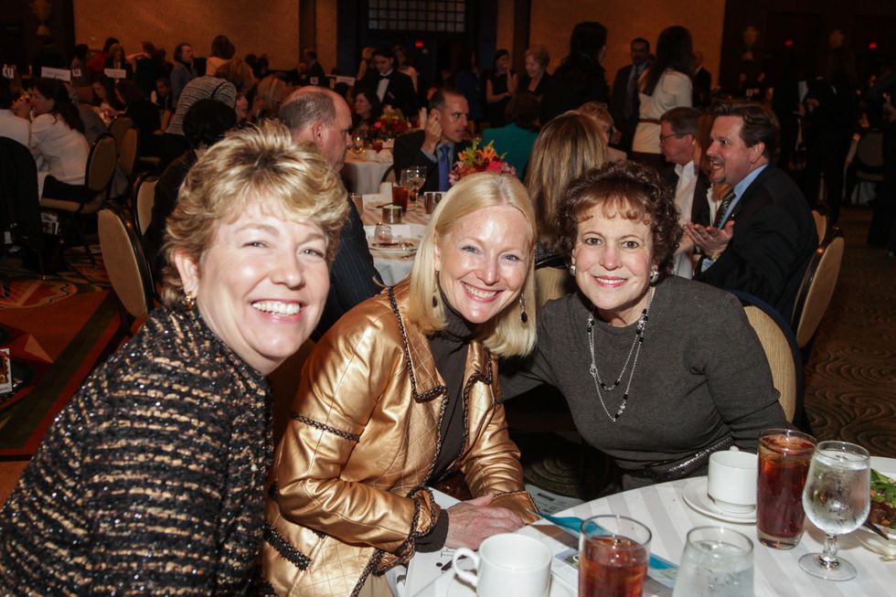 Kelly Zuniga, from left, Trish Morille and Regina Rogers at the National Philanthropy Day Awards November 2014