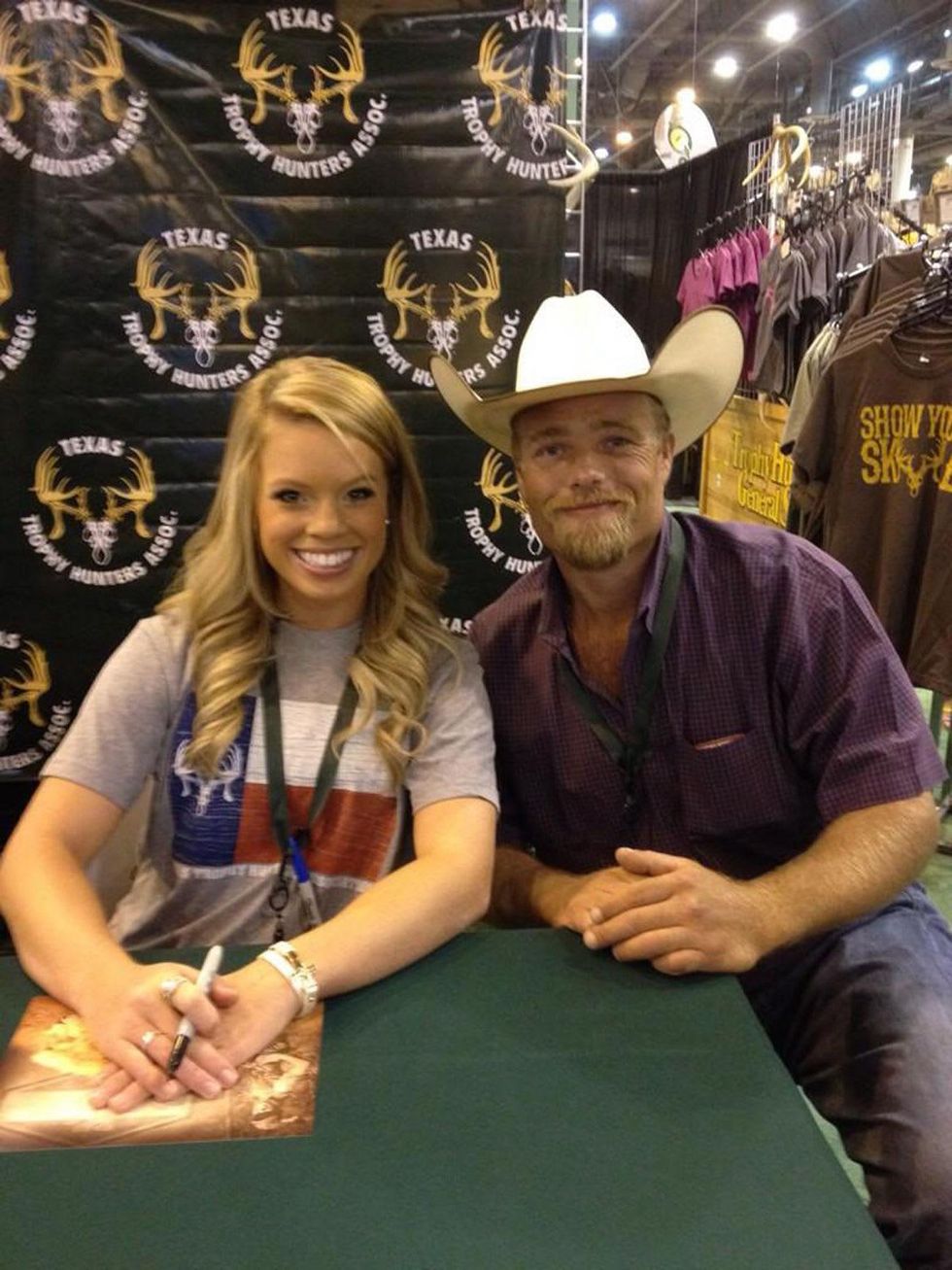 Kendall Jones at hunting expo NRG Park August 2014 with dude