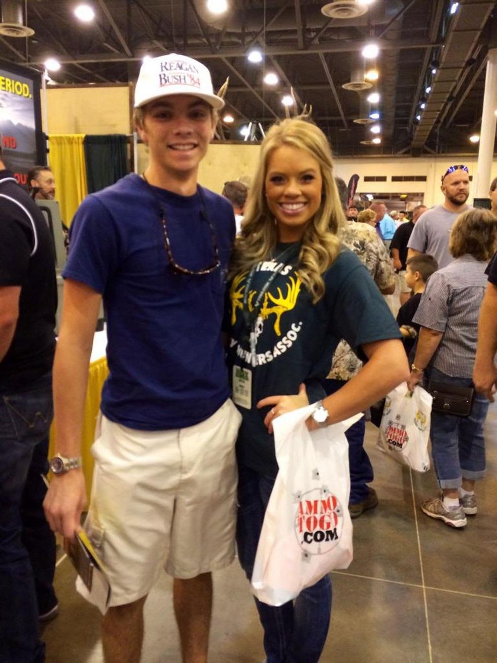 Kendall Jones at hunting expo NRG Park August 2014 with fan