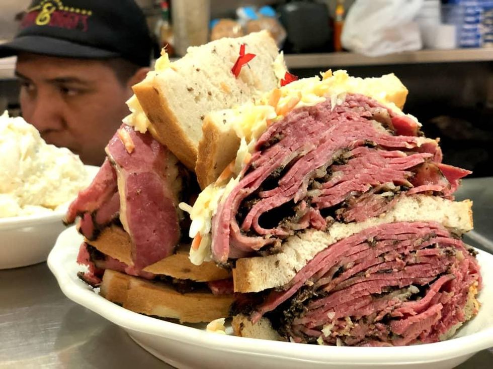 Kenny & Ziggy's triple decker pastrami sandwich