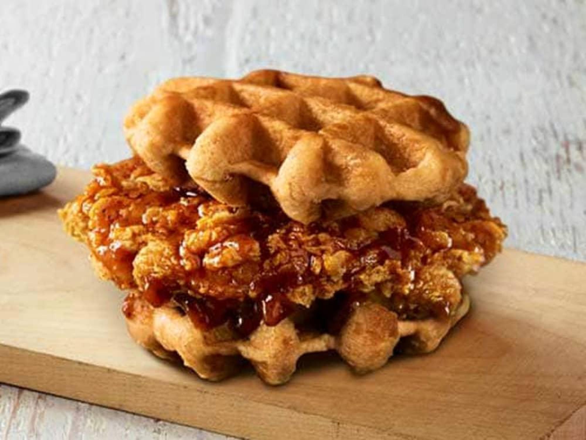 KFC's sweet and savory Chicken & Waffles Sandwich makes for a tall