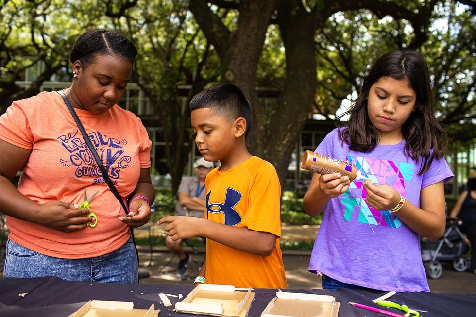 Kids doing crafts at Discovery Green