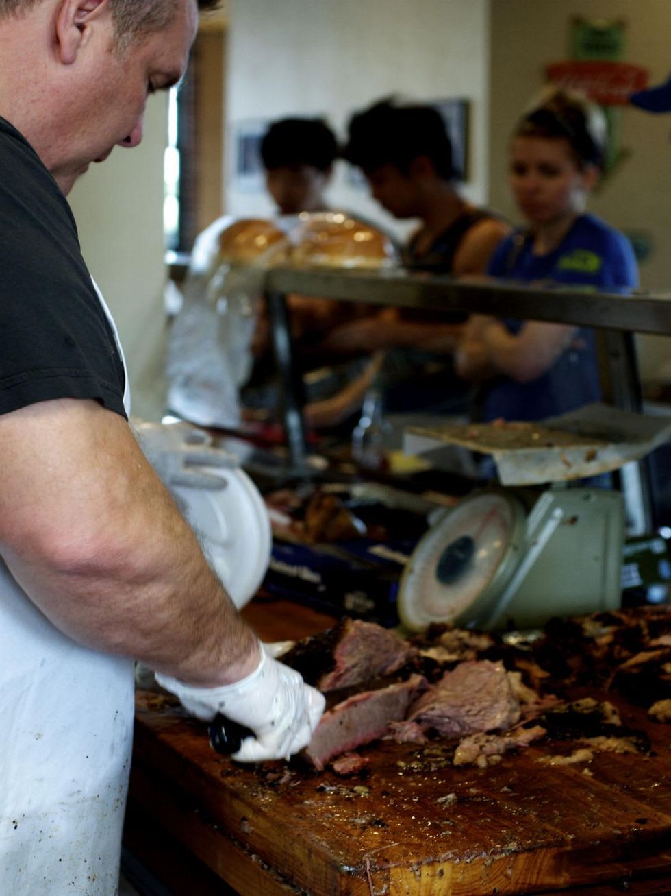Killen's barbecue slicing meat