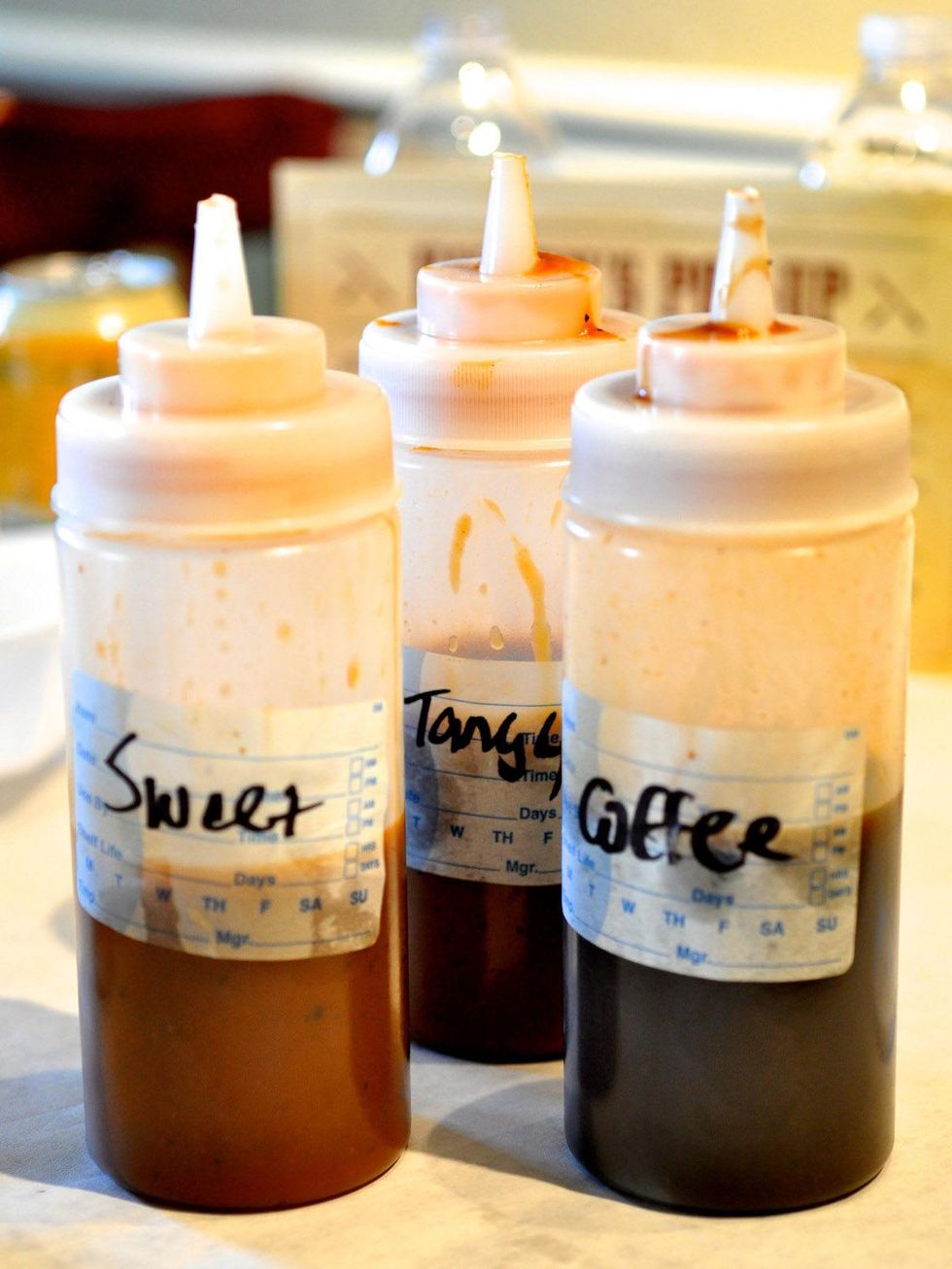 Killen's coffee sauce barbecue sauce in containers